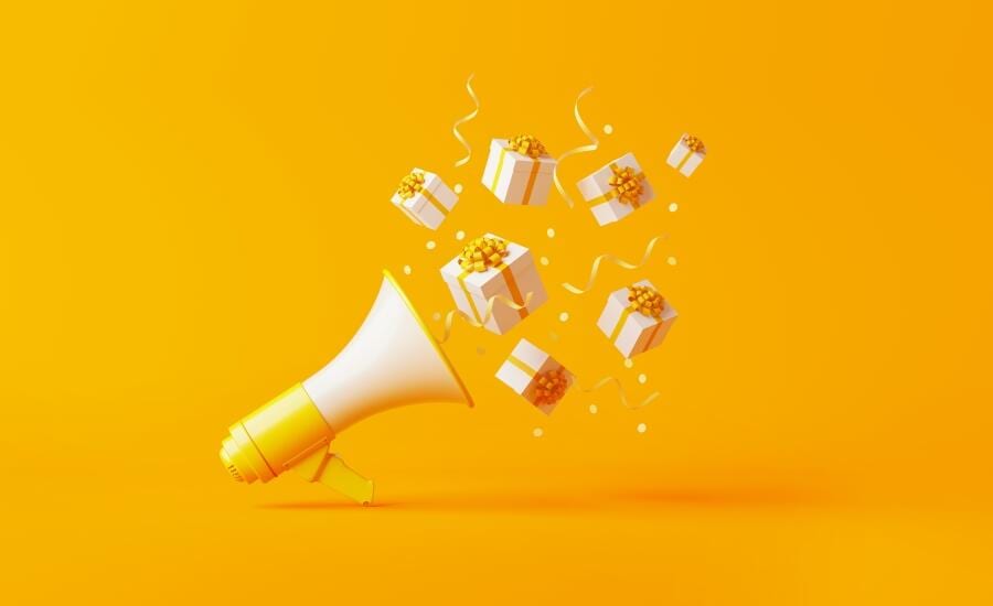 White gift boxes with golden ribbons bursting from a megaphone on a vibrant yellow background.