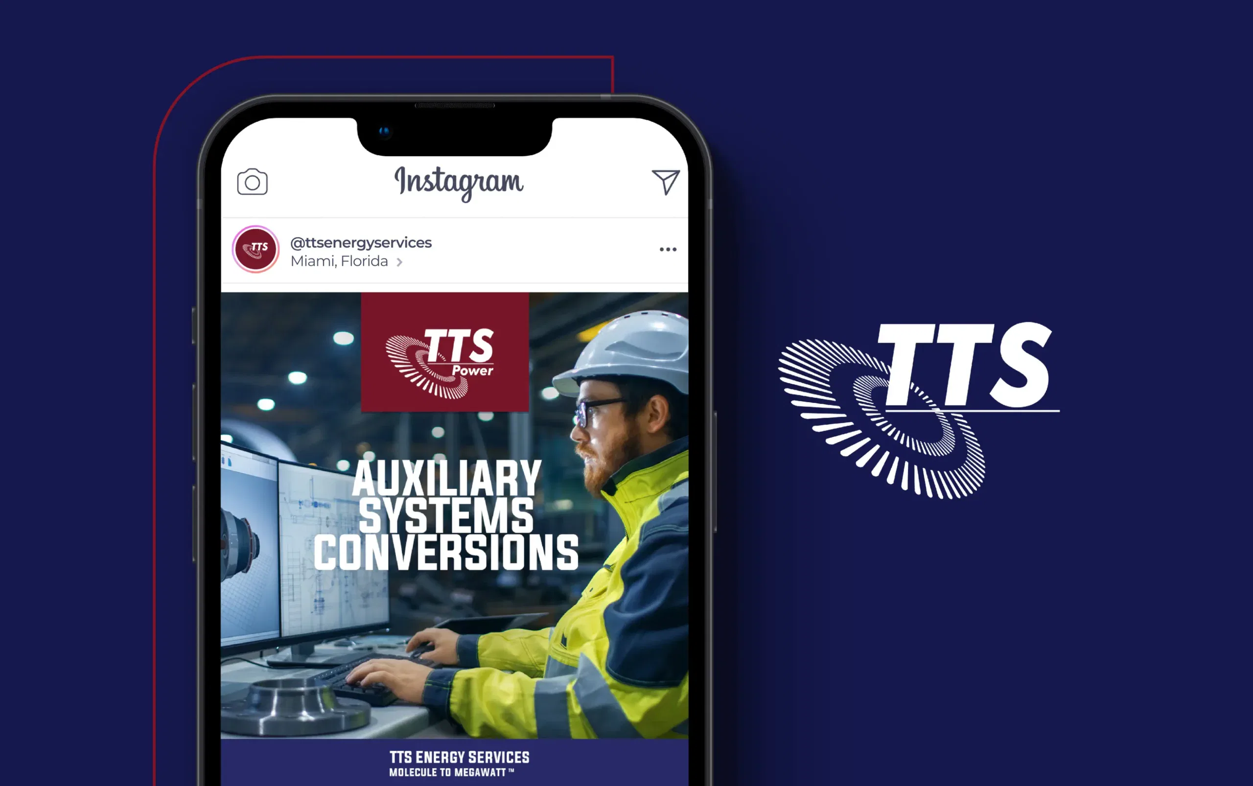 Person in safety gear working on a computer displaying 