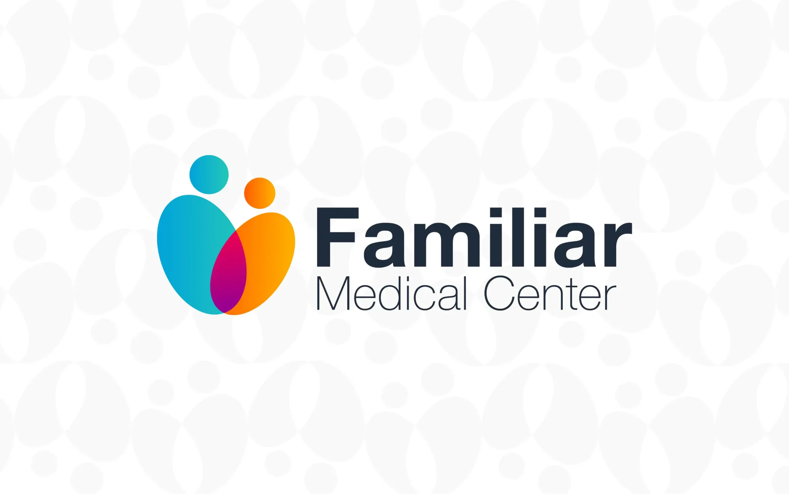 Familiar Medical Center logo featuring two abstract human figures in a heart-shaped design.