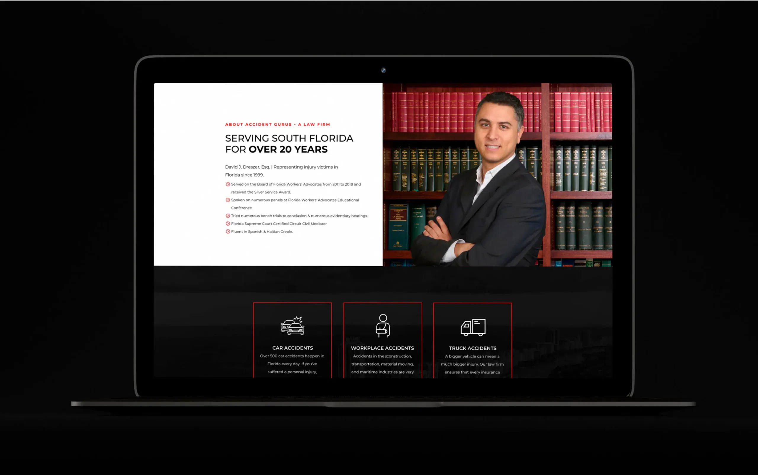 Professional man in suit standing confidently with arms crossed in front of bookshelves on a laptop screen.