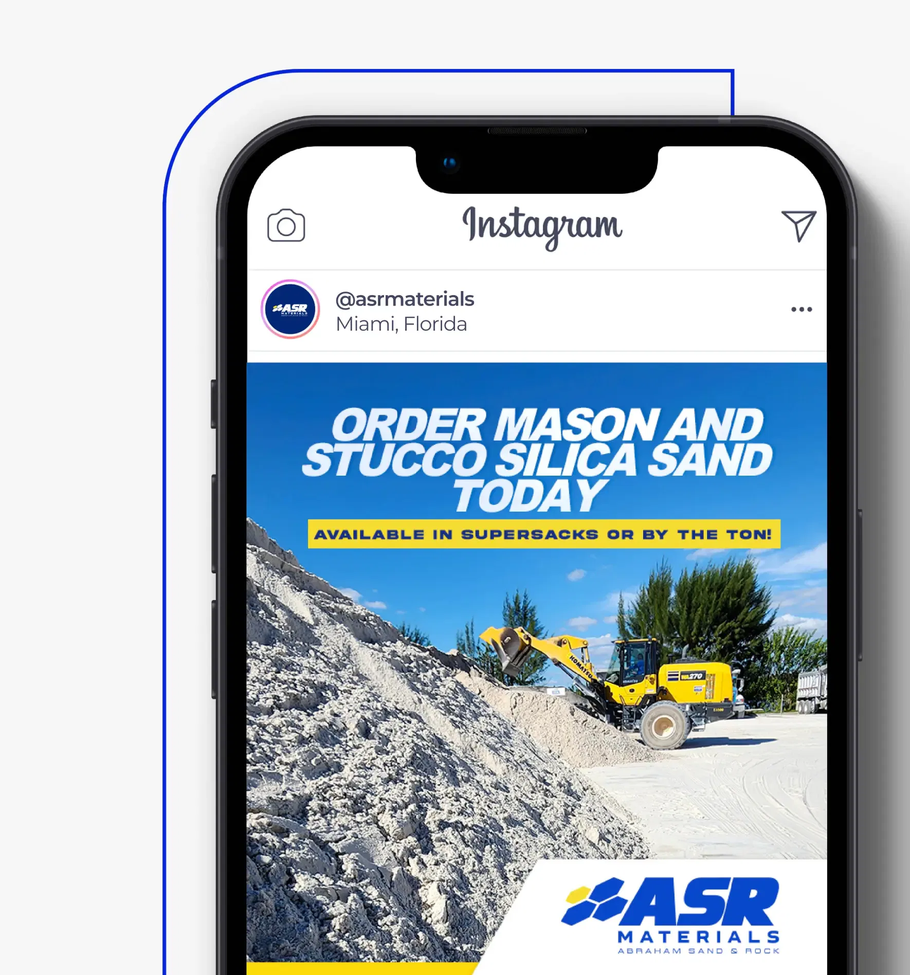 Smartphone displaying Instagram post featuring a loader gathering silica sand at ASR Materials in Miami, Florida.