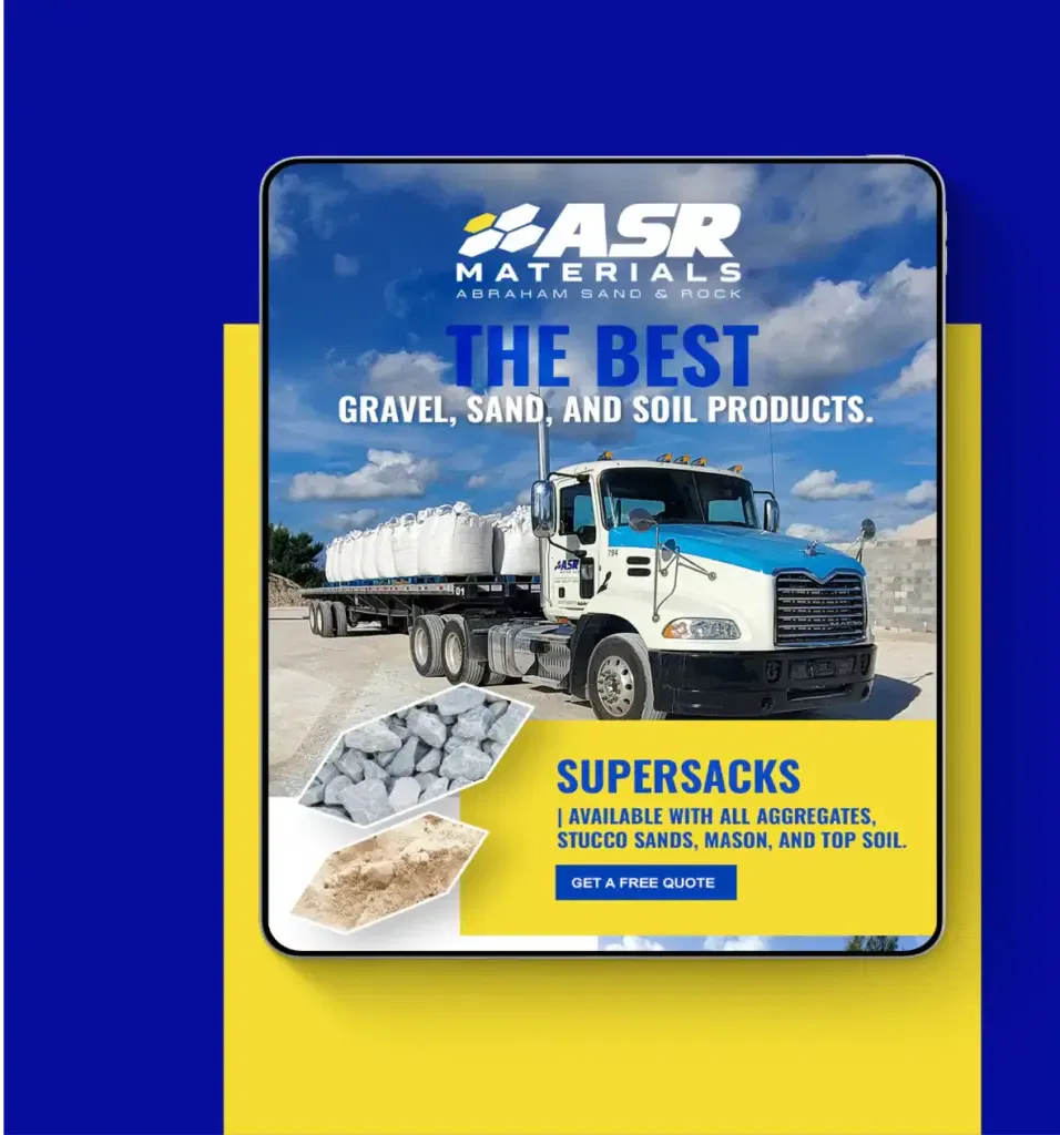 Truck transporting gravel and sand with ASR Materials branding and Supersacks promotion.