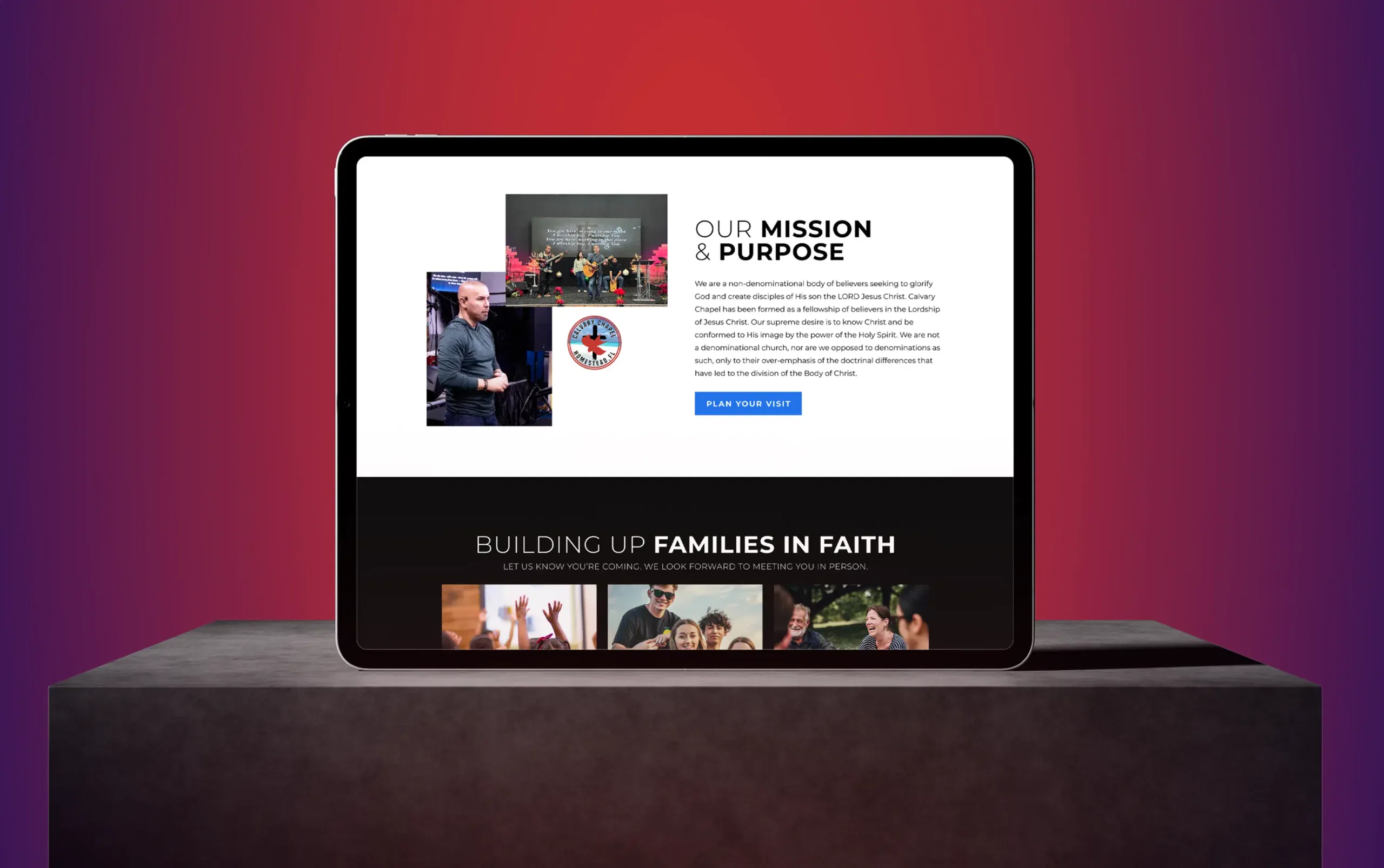 Tablet displaying a website about family and faith against a gradient red background.