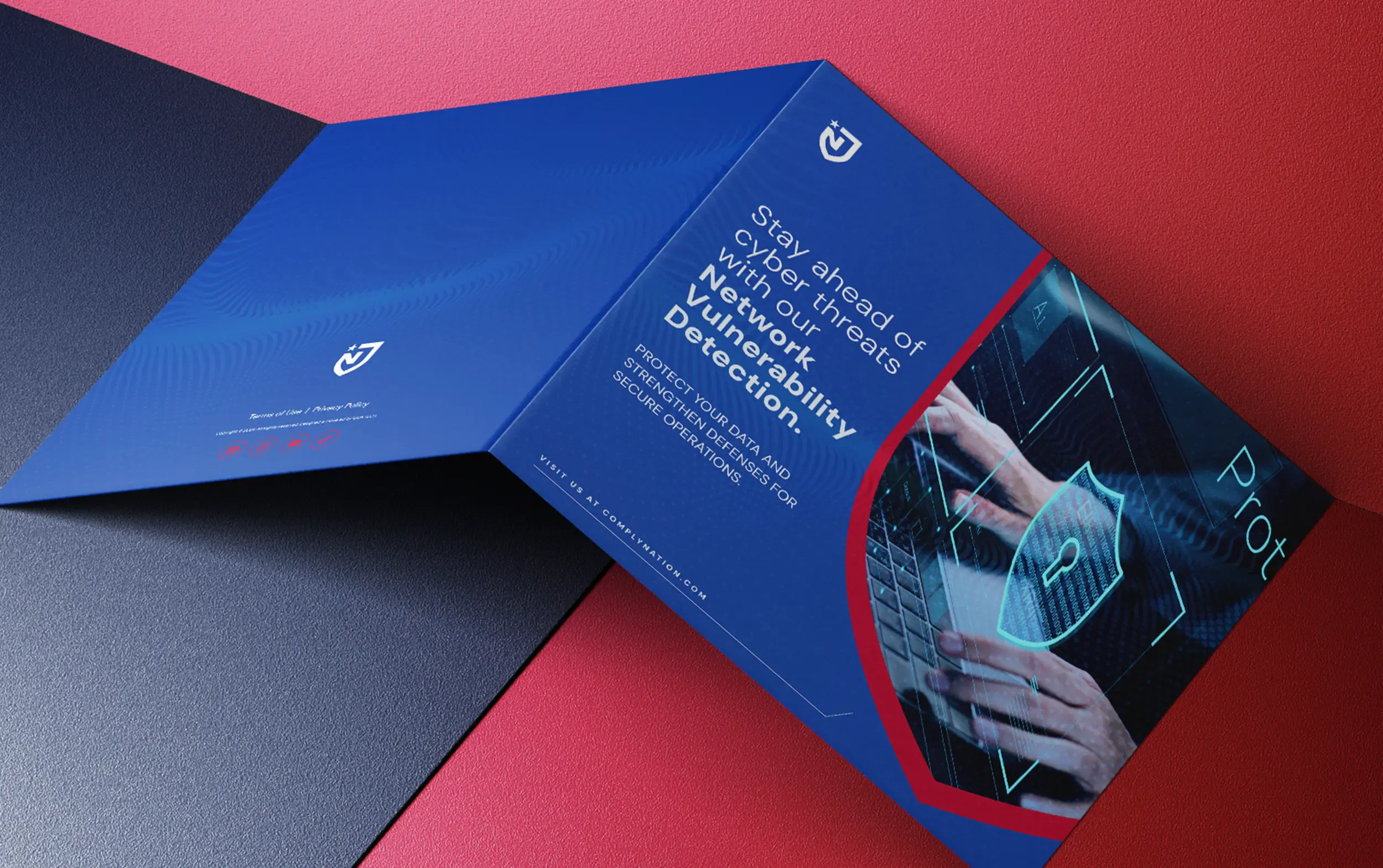 Hands typing on a laptop with cybersecurity graphics, illustrating network vulnerability detection.