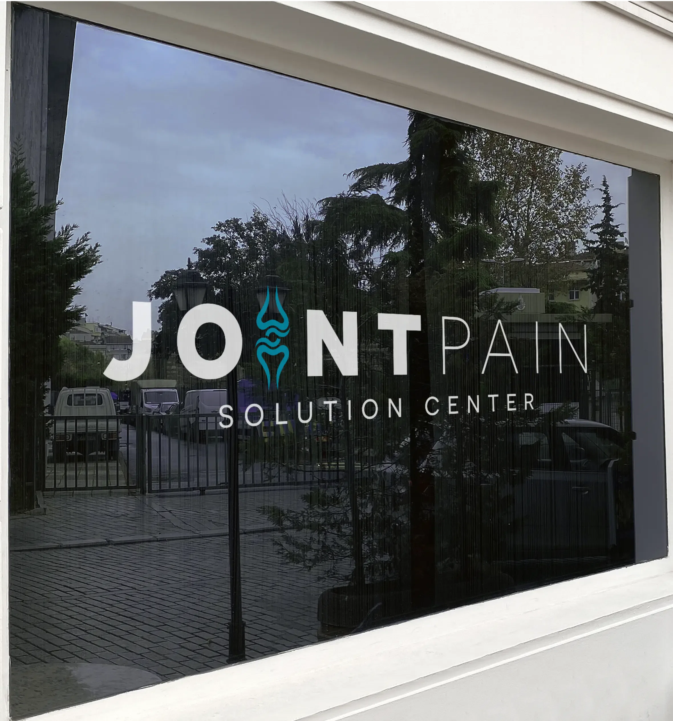 Joint Pain Solution Center exterior window view.