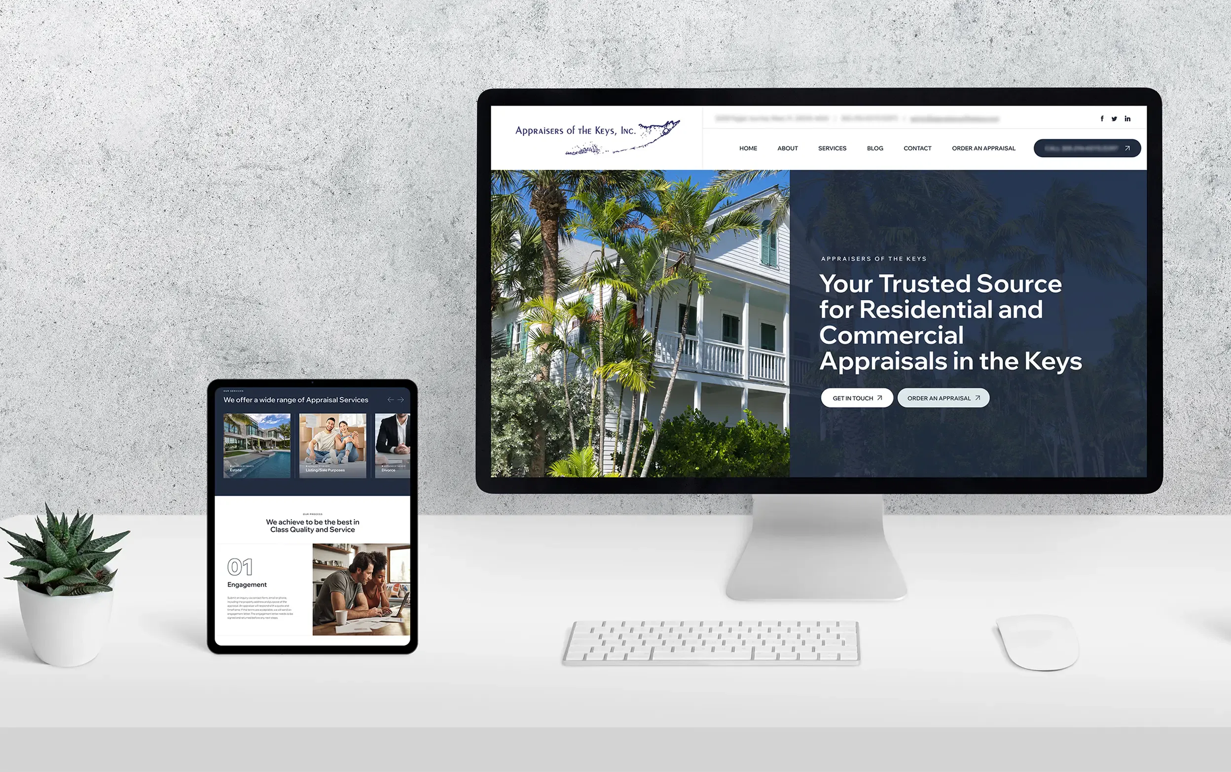 Computer and tablet displaying a real estate appraisal website with a home image.