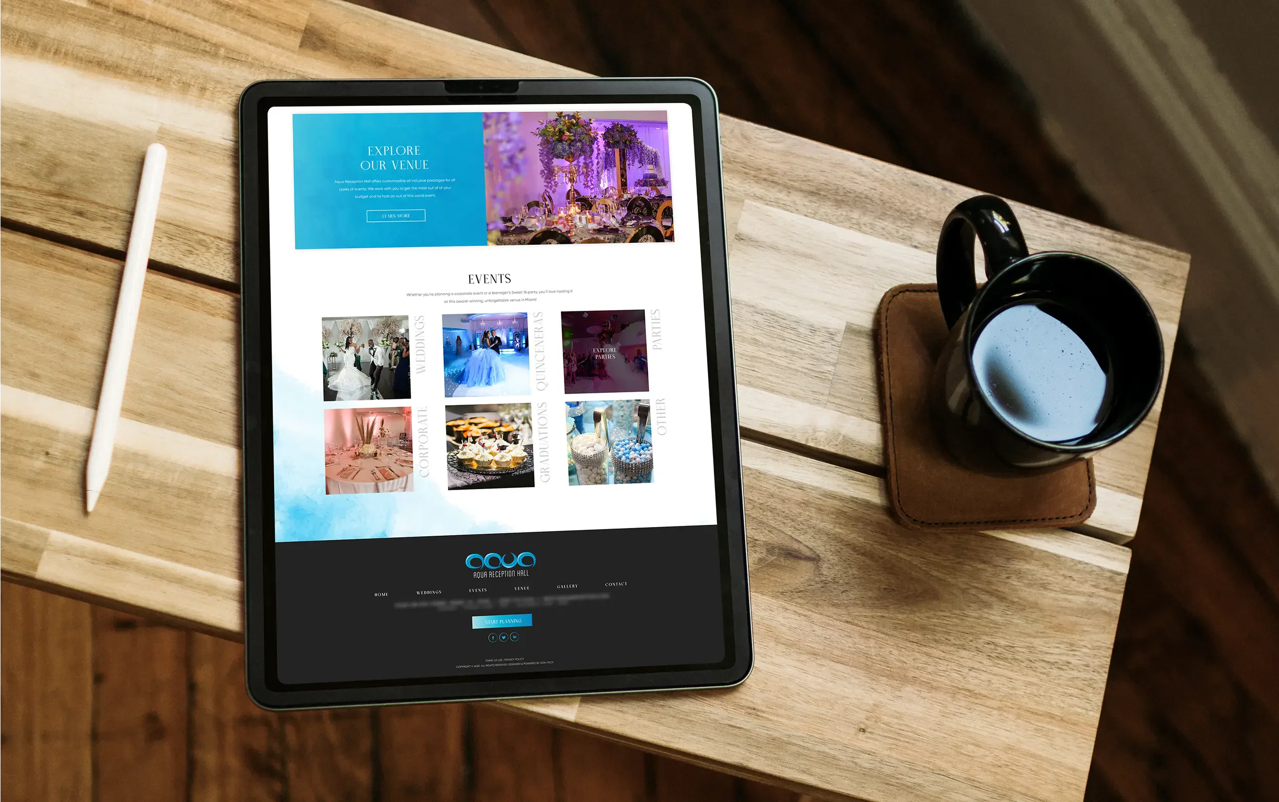 Tablet on a wooden desk displaying a colorful website with vibrant images and text.