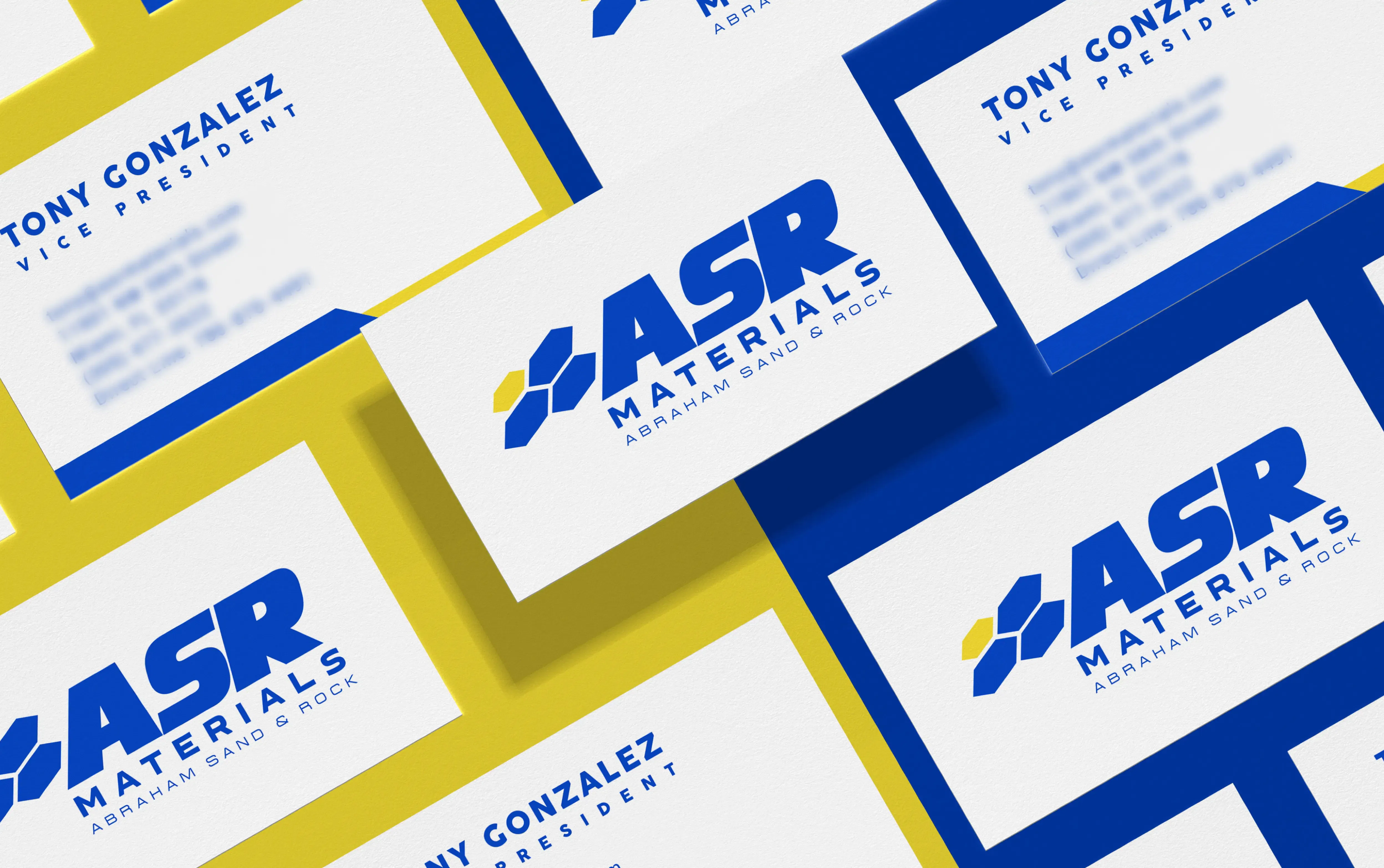 Business cards displaying ASR Materials logo in a modern design layout.