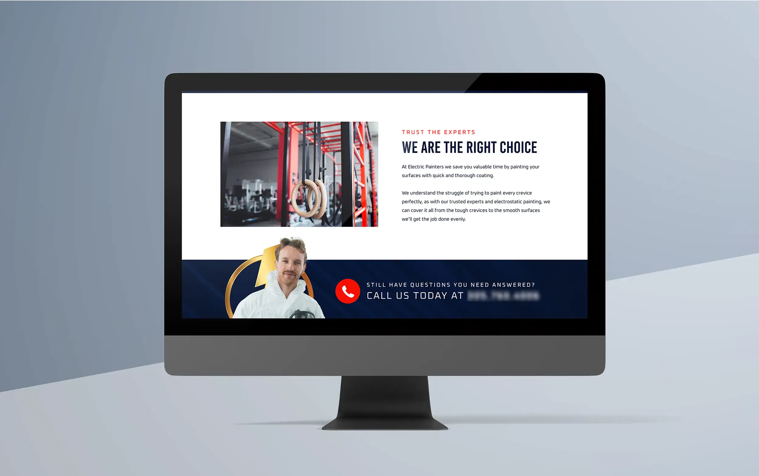 Computer monitor displaying a business website with a professional theme.