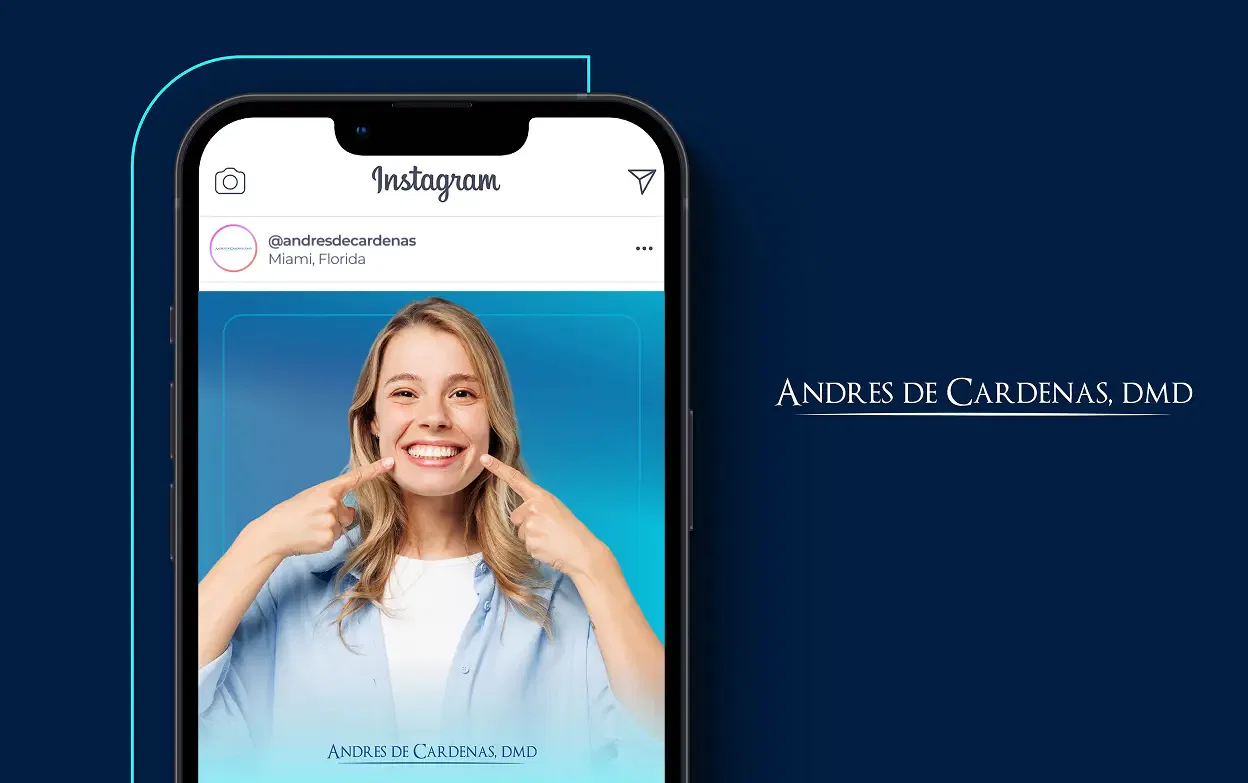 Smiling woman pointing to her teeth on a smartphone display with a sleek blue background.