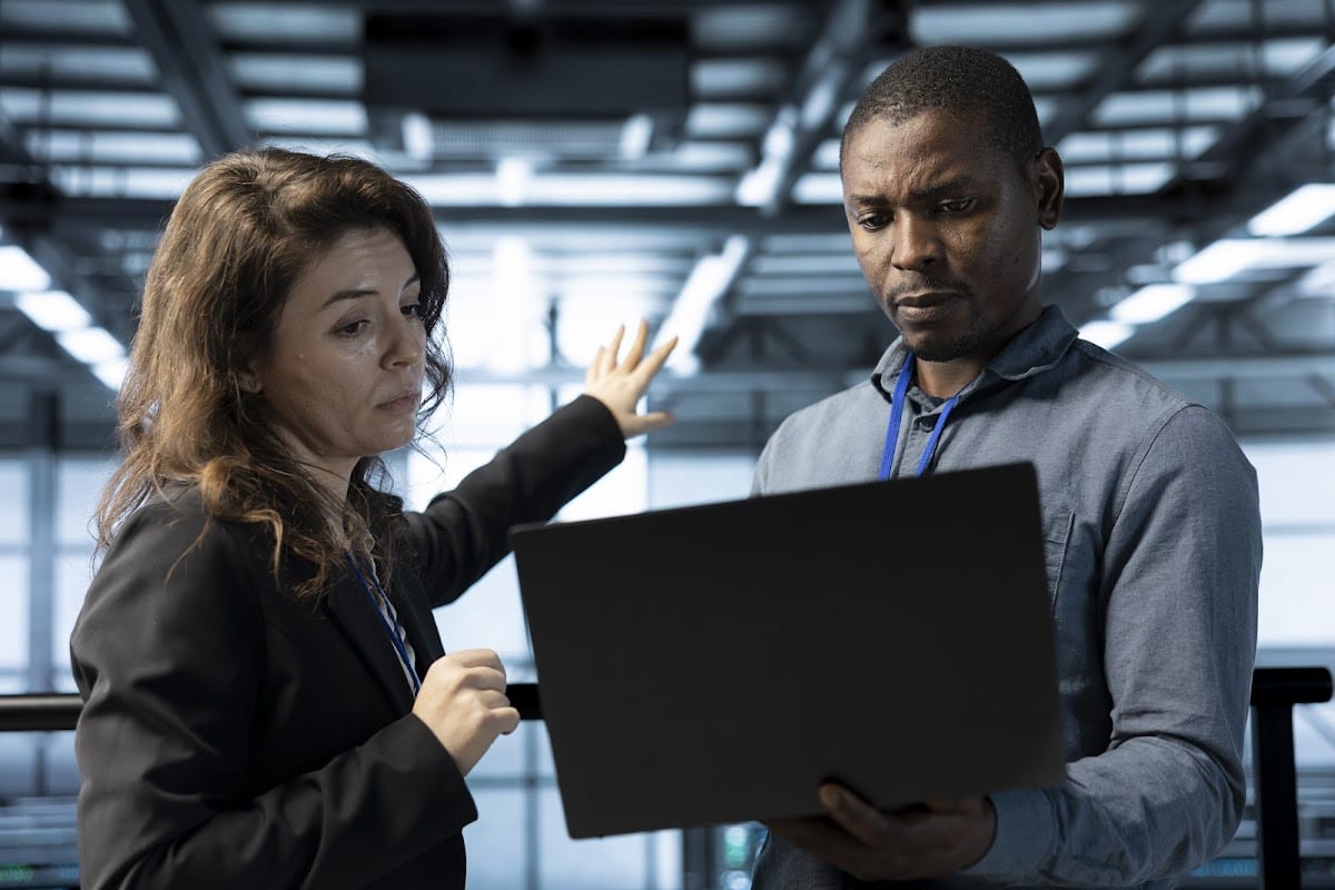 GOA-TECH cybersecurity professionals strategizing data protection solutions for businesses.