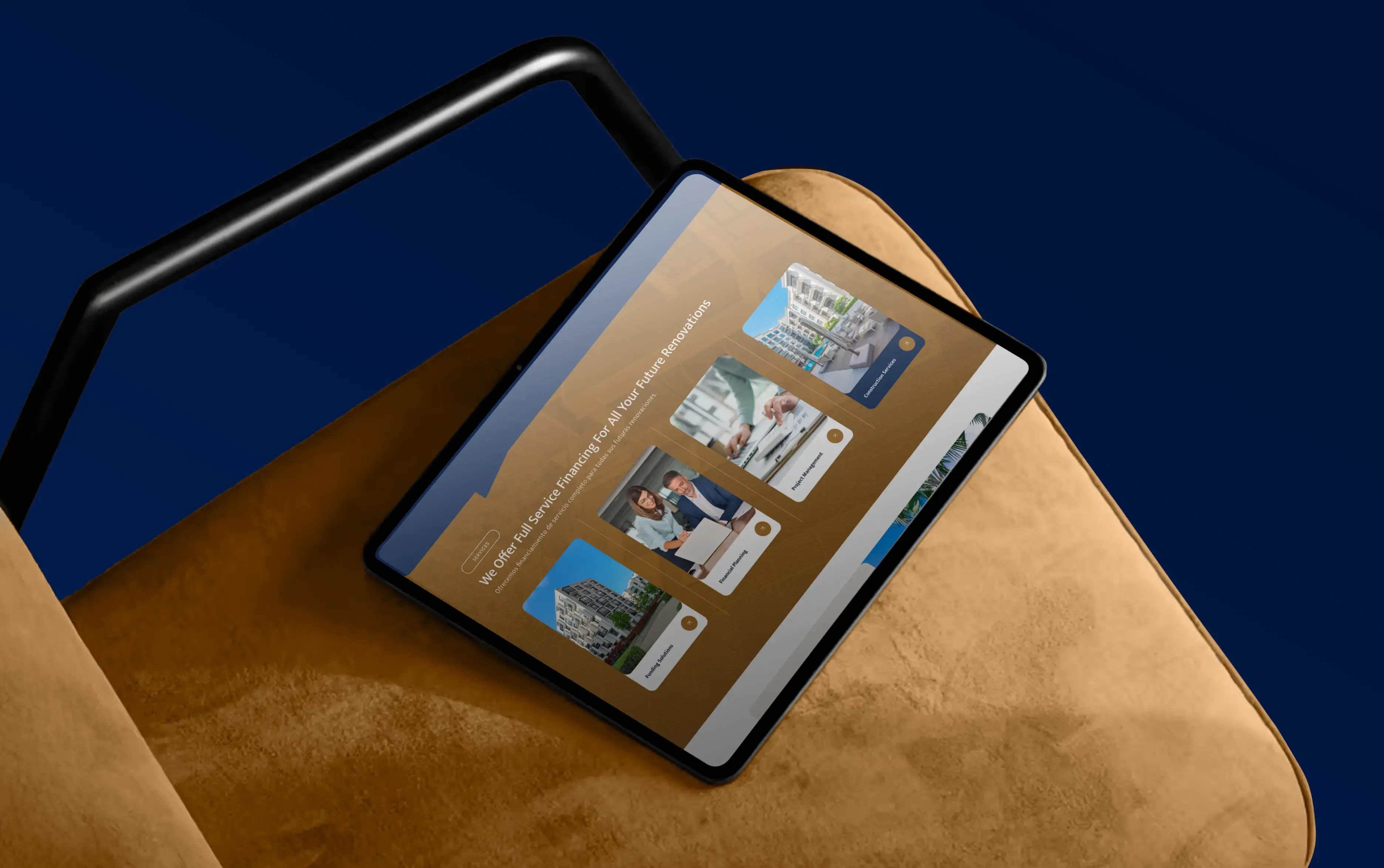 Tablet displaying various architectural designs on a brown surface with a blue background.