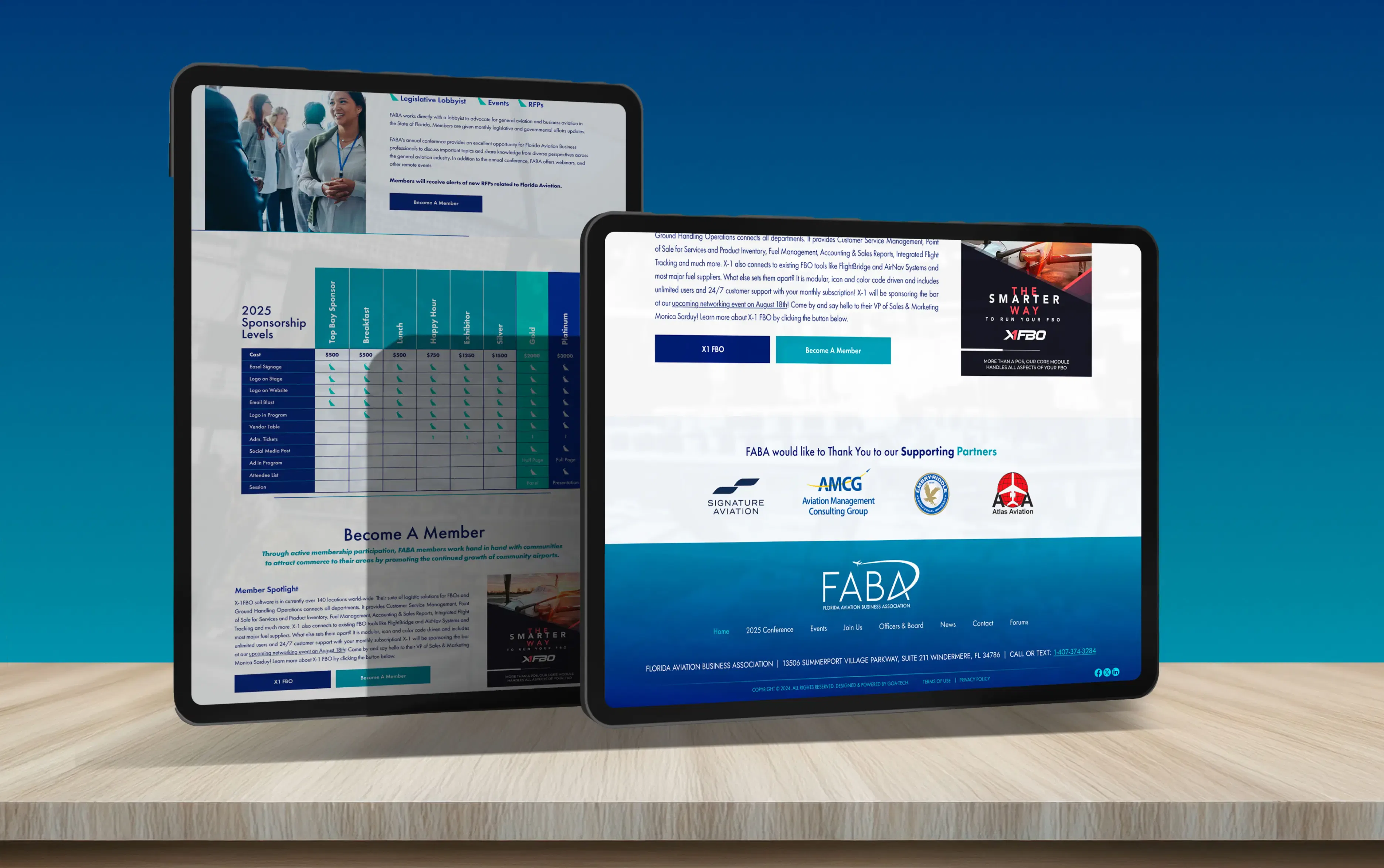 Two tablets displaying business and tech-related web pages on a wooden desk, set against a gradient blue background.