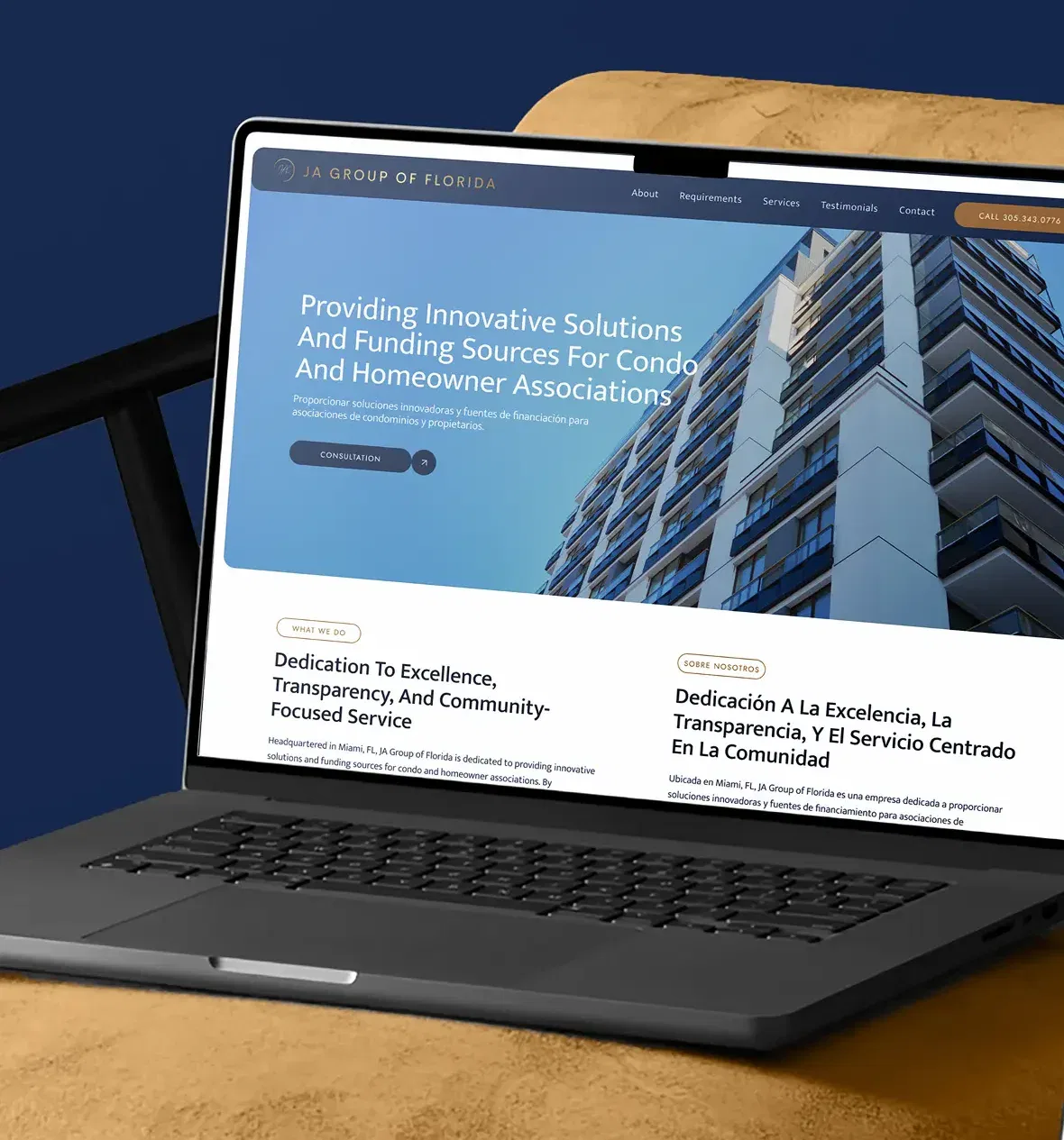 Laptop displaying website for condo association solutions and funding on a cushioned chair.