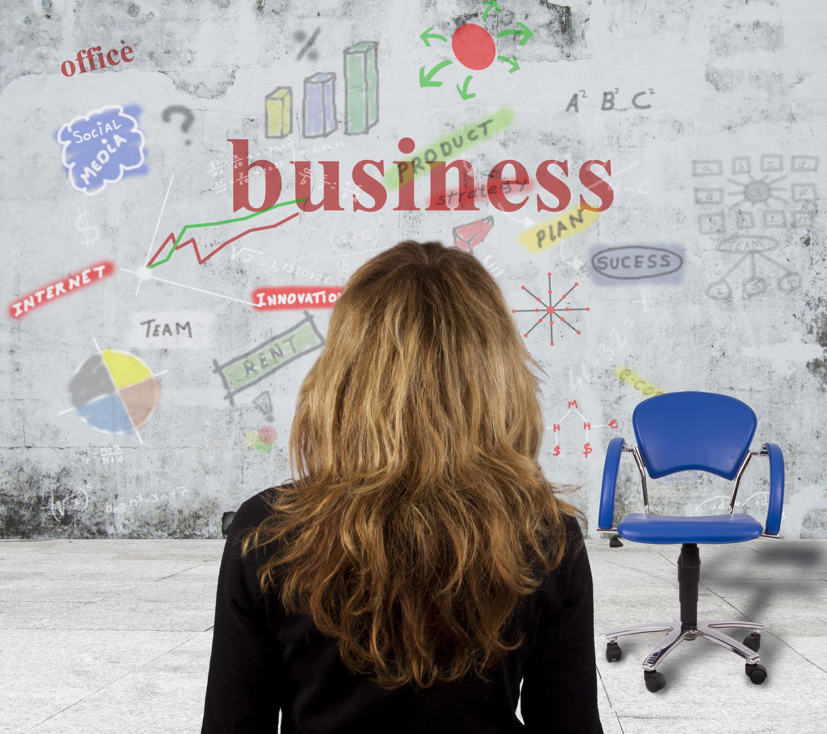 Woman viewing business strategy and planning graphics