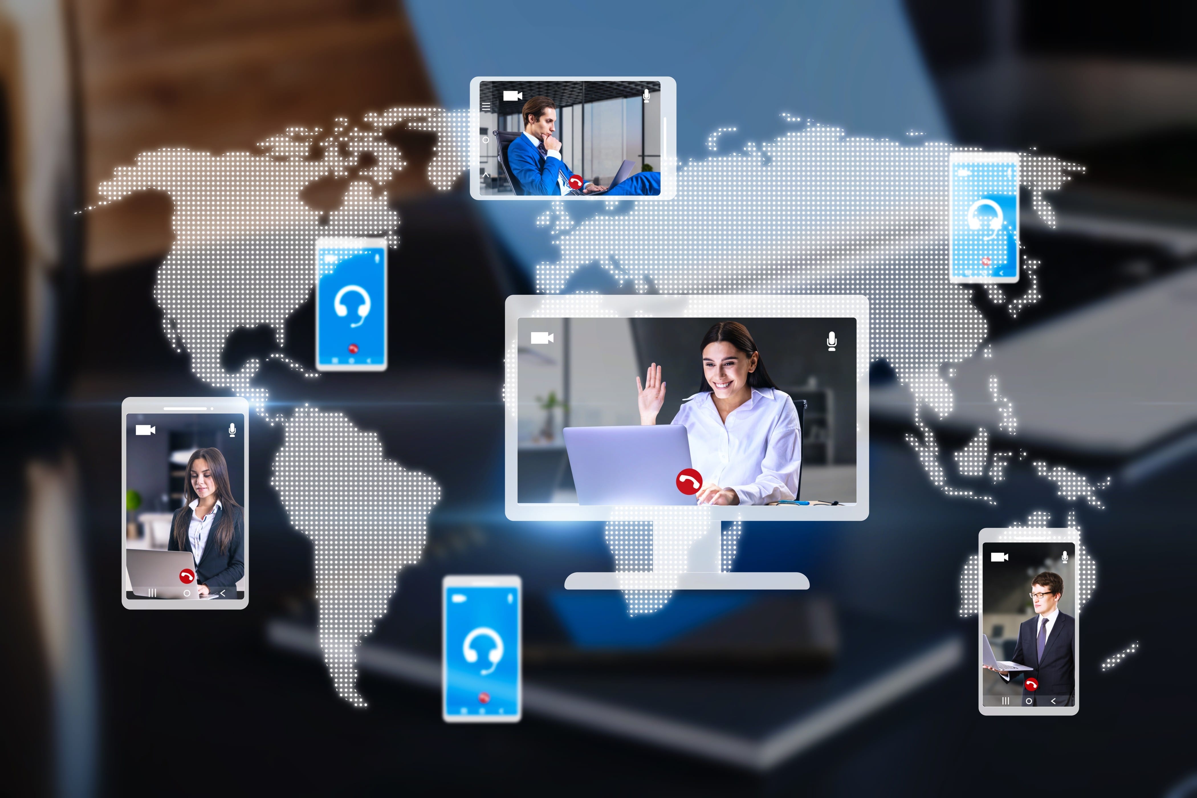 Businesswoman video calling with global network icons