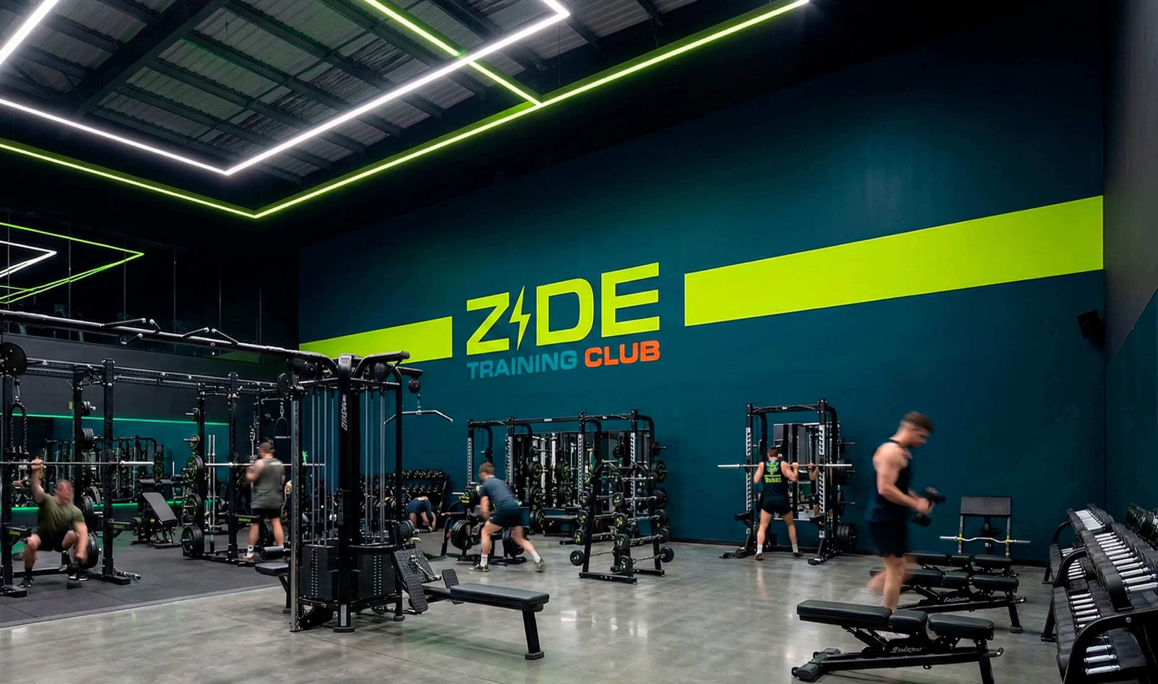 Gym interior with people lifting weights