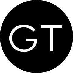 Black circular logo featuring white letters GT at the center.